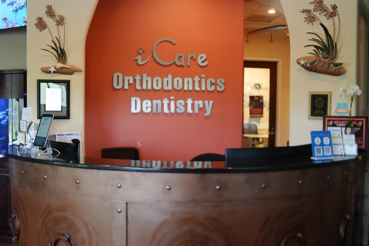 iCare Orthodontics & Dentistry reception desk and waiting area in Norcross, GA